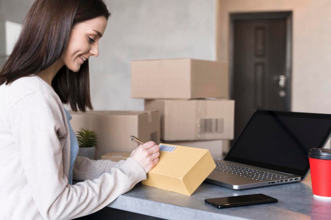 side view woman writing box work